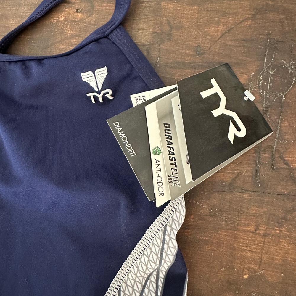 TYR swim suit racing/practice navy w white panels. Girls size 28. New w tags